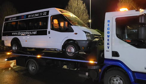 Breakdown Sheffield recovery truck loading broken down minibus 